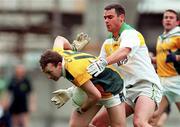 4 June 2000; Barry Callaghan of Meath in action against Sean Grennan of Offaly during the Bank of Ireland Leinster Senior Football Championship Quarter-Final match between Offaly and Meath in Croke Park, Dublin. Photo by Damien Eagers/Sportsfile