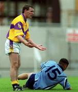 11 June 2000; Colm Morris of Wexford reacts to the referee after fouling Dublin's Jason Sherlock of Dublin during the Bank of Ireland Leinster Senior Football Championship Quarter-Final match between Dublin and Wexford at Croke Park in Dublin. Photo by Brendan Moran/Sportsfile