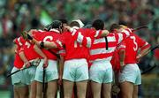 4 June 2000; The Cork team huddle prior to the Guinness Munster Senior Hurling Championship Semi-Final between Cork and Limerick at Semple Stadium in Thurles, Tipperary. Photo by Ray McManus/Sportsfile
