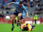 11 June 2000; Darren Homan of Dublin in action against Tom Howlin of Wexford during the Bank of Ireland Leinster Senior Football Championship Quarter-Final match between Dublin and Wexford at Croke Park in Dublin. Photo by Brendan Moran/Sportsfile