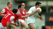 11 June 2000; Dermot Earley of Kildare in action against Martin Farrelly and Brendan Reilly of Louth during the Bank of Ireland Leinster Senior Football Championship Quarter-Final match between Kildare and Louth at Croke Park in Dublin. Photo by Brendan Moran/Sportsfile