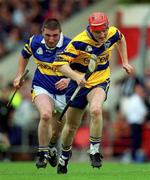 11 June 2000; Brian Logan of Clare in action against Paul Shelley of Tipperary during the Guinness Munster Senior Hurling Championship Semi-Final match between Tipperary and Clare at Páirc Ui Chaoimh in Cork. Photo by Ray McManus/Sportsfile