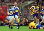 11 June 2000; Mark O'Leary of Tipperary in action against Anthony Daly Clare during the Guinness Munster Senior Hurling Championship Semi-Final match between Tipperary and Clare at Páirc Ui Chaoimh in Cork. Photo by Ray McManus/Sportsfile