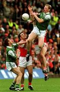 25 June 2000; Liam McBarron of Fermanagh contests a kickout with John McEntee of Armagh as team-mate Raymond Johnston, left, and Andrew McCann of Armagh look on during the Bank of Ireland Ulster Senior Football Championship Semi-Final match between Armagh and Fermanagh at St Tiernach's Park in Clones, Monaghan. Photo by David Maher/Sportsfile