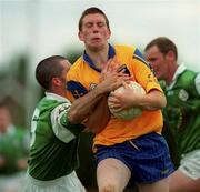 4 June 2000; Gerry Lohan of Roscommon is tackled by Neil McSheery of London during the Bank of Ireland Connacht Senior Football Championship Quarter-Final match between London and Roscommon at Emerald GAA Grounds in Ruislip, England. Photo by Aoife Rice/Sportsfile