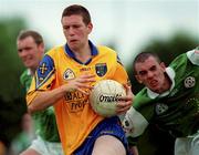 4 June 2000; Gerry Lohan of Roscommon is tackled by Neil McSheery of London during the Bank of Ireland Connacht Senior Football Championship Quarter-Final match between London and Roscommon at Emerald GAA Grounds in Ruislip, England. Photo by Aoife Rice/Sportsfile