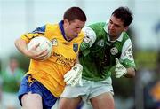 4 June 2000; Gerry Lohan of Roscommon in action against Colin McCarthy of London during the Bank of Ireland Connacht Senior Football Championship Quarter-Final match between London and Roscommon at Emerald GAA Grounds in Ruislip, England. Photo by Aoife Rice/Sportsfile
