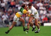 25 June 2000; John Finn of Kildare in action against Ronan Mooney of Offaly during the Bank of Ireland Leinster Senior Football Championship Semi-Final match between Kildare and Offaly at Croke Park in Dublin. Photo by Ray McManus/Sportsfile