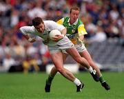 25 June 2000; John Finn of Kildare in action against Ronan Mooney of Offaly during the Bank of Ireland Leinster Senior Football Championship Semi-Final match between Kildare and Offaly at Croke Park in Dublin. Photo by Ray McManus/Sportsfile