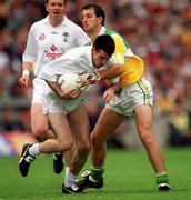 25 June 2000; Ken Doyle of Kildare in action against Roy Malone of Offaly during the Bank of Ireland Leinster Senior Football Championship Semi-Final match between Kildare and Offaly at Croke Park in Dublin. Photo by Ray McManus/Sportsfile