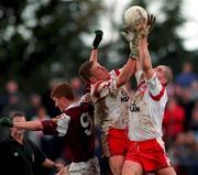 29 April 2000; Kevin Hughes, right, and Cormac McAnallen of Tyrone in action against Kieran Fitzerald of Galway during the All-Ireland Under 21 Football Championship Semi-Final match between Galway and Tyrone at Páirc Seán Mac Diarmada in Carrick-On-Shannon, Leitrim. Photo by Damien Eagers/Sportsfile
