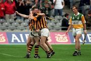 5 July 1998; Niall Moloney, left, and Michael Kavanagh of Kilkenny celebrate as Joe Dooley of Offaly leaves the pitch after the Guinness Leinster Senior Hurling Championship Final match between Kilkenny and Offaly at Croke Park in Dublin. Photo by Ray McManus/Sportsfile