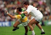25 June 2000; Roy Malone of Offaly in action against Ronan Quinn of Kildare during the Bank of Ireland Leinster Senior Football Championship Semi-Final match between Kildare and Offaly at Croke Park in Dublin. Photo by Ray McManus/Sportsfile