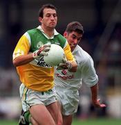 25 June 2000; Roy Malone of Offaly in action against Anthony Rainbow of Kildare during the Bank of Ireland Leinster Senior Football Championship Semi-Final match between Kildare and Offaly at Croke Park in Dublin. Photo by Aoife Rice/Sportsfile