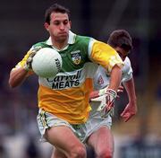 25 June 2000; Roy Malone of Offaly in action against Anthony Rainbow of Kildare during the Bank of Ireland Leinster Senior Football Championship Semi-Final match between Kildare and Offaly at Croke Park in Dublin. Photo by Aoife Rice/Sportsfile