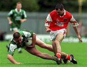 25 June 2000; Sean Burns of Fermanagh in action against Steven McDonnell of Armagh during the Bank of Ireland Ulster Senior Football Championship Semi-Final match between Armagh and Fermanagh at St Tiernach's Park in Clones, Monaghan. Photo by David Maher/Sportsfile