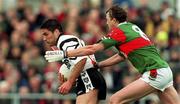 11 June 2000; Sean Davey of Sligo is tackled by Pat Fallon of Mayo during the Bank of Ireland Connacht Senior Football Championship Quarter-Final match between Sligo and Mayo at Markievicz Park in Sligo. Photo by Damien Eagers/Sportsfile