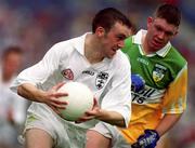 25 June 2000; Tadgh Fennin of Kildare of in action against Cathal Daly of Offaly during the Bank of Ireland Leinster Senior Football Championship Semi-Final match between Kildare and Offaly at Croke Park in Dublin. Photo by Ray McManus/Sportsfile