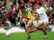 25 June 2000;  Thomas Grennan of Offaly in action against Derek Maher of Kildare during the Bank of Ireland Leinster Senior Football Championship Semi-Final match between Kildare and Offaly at Croke Park in Dublin. Photo by Ray McManus/Sportsfile