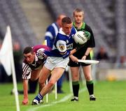 25 June 2000; Ross Munnelly of Laois in action against Gary Glennon of Westmeath during the Leinster Minor Football Championship Semi-Final match between Westmeath and Laois at Croke Park in Dublin. Photo by Ray McManus/Sportsfile