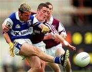 25 June 2000; Gary Walsh of Laois in action against Gary Glennon of Westmeath during the Leinster Minor Football Championship Semi-Final match between Westmeath and Laois at Croke Park in Dublin. Photo by Ray McManus/Sportsfile