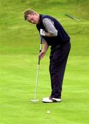 30 June 2000; Paddy Gribben of Ireland putts on the 13th green during the second day of the Murphy's Irish Open Golf Championship at Ballybunion Golf Club in Kerry. Photo by Brendan Moran/Sportsfile