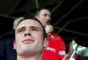 2 July 2000; Sean McGrath of Cork listens as team captain Fergal Ryan makes a speech after lifting the cup, following the Guinness Munster Senior Hurling Championship Final between Cork and Tipperary at Semple Stadium in Thurles, Tipperary. Photo by Brendan Moran/Sportsfile