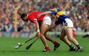 2 July 2000; Sean Og O'hAilpin of Cork in action against Brian O'Meara of Tipperary during the Guinness Munster Senior Hurling Championship Final between Cork and Tipperary at Semple Stadium in Thurles, Tipperary. Photo by Ray McManus/Sportsfile