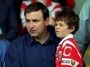 2 July 2000; Minster for Health Micheál Martin T.D. and his son Micheal Aodh, in attendance during the Guinness Munster Senior Hurling Championship Final between Cork and Tipperary at Semple Stadium in Thurles, Tipperary. Photo by Ray McManus/Sportsfile