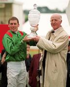 1 July 2000; Winning jockey Johnny Murtagh and trainer John Oxx with the trophy after victory with Sinndar in the Budweiser Irish Derby at The Curragh Racecourse in Kildare. Photo by Damien Eagers/Sportsfile