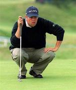 30 June 2000; Sean Quinlivan of Ireland lines up a putt on the eighth green during the second day of the Murphy's Irish Open Golf Championship at Ballybunion Golf Club in Kerry. Photo by Matt Browne/Sportsfile