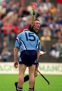 5 June 2000; Referee Willie Barrett shows a red card to Niall Butler of Dublin during the Guinness Leinster Senior Hurling Championship Play-Off replay match between Dublin and Laois at O'Connor Park in Tullamore, Offaly. Photo by Damien Eagers/Sportsfile
