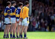14 May 2000; Tipperary players, from left, Michael Ryan, Philip Maher, Liam Sheedy and Brendan Cummins stand for Amhrán na bhFiann prior to the Church & General National Hurling League Final match between Tipperary and Galway at Gaelic Grounds in Limerick. Photo By Brendan Moran/Sportsfile
