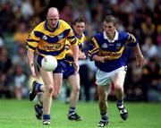 25 June 2000; Donal O'Sullivan of Clare in action against John Shanahan of Tipperary during the Bank of Ireland Munster Senior Football Championship Semi-Final match between Clare and Tipperary at the Gaelic Grounds in Limerick. Photo by Brendan Moran/Sportsfile