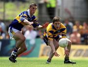 25 June 2000; Conor Whelan of Clare in action against John Shanahan of Tipperary during the Bank of Ireland Munster Senior Football Championship Semi-Final match between Clare and Tipperary at the Gaelic Grounds in Limerick. Photo by Brendan Moran/Sportsfile
