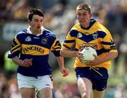 25 June 2000; David Russell of Clare in action against Dan Hackett of Tipperary during the Bank of Ireland Munster Senior Football Championship Semi-Final match between Clare and Tipperary at the Gaelic Grounds in Limerick. Photo by Brendan Moran/Sportsfile