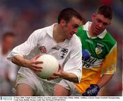 25 June 2000; Tadgh Fennin, Kildare, in action against Cathal Daly, Offaly. Offaly v Kildare, Leinster Senior Football Championship, Croke Park, Dublin. Picture credit; Ray McManus/SPORTSFILE