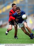 3 July 2000; James Keane, Tullamore holds off the challenge of Sean Parr, St. Bronagh's, Rostrevor, Feile Peil na nOg, Tullamore, (Co. Offaly) v St. Bronagh's, Rostrevor, (Co. Down), Boys U14 Football Division 2 Final, Croke Park. Picture credit; Damien Eagers/SPORTSFILE