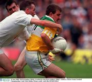 25 June 2000; Mel Keenaghan, Offaly, is tackled by Glenn Ryan, Kildare. Offaly v Kildare, Leinster Senior Football Championship, Croke Park, Dublin. Picture credit; Aoife Rice/SPORTSFILE