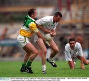 25 June 2000; Ronan Sweeney, Kildare, in action against Bernard O'Brien, Offaly. Offaly v Kildare, Leinster Senior Football Championship, Croke Park, Dublin. Picture credit; Ray McManus/SPORTSFILE