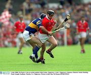 2 July 2000; Pat Ryan, Cork, in action against John Leahy, Tipperary. Cork v Tipperary, Guinness Munster Senior Hurling Final, Semple Stadium, Thurles, Co. Tipperary. Picture credit; Ray McManus/SPORTSFILE