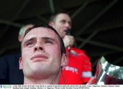 2 July 2000; Sean McGrath, Cork, listens as captain Fergal Ryan makes his speech after the game. Cork v Tipperary, Guinness Munster Senior Hurling Final, Semple Stadium, Thurles, Co. Tipperary. Picture credit; Brendan Moran/SPORTSFILE
