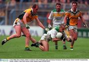 4 June 2000; Barry Malone, Offaly is tackled by John McDermott, (left) and Ronan Fitzsimons, Meath, Leinster Senior Football Championship, Meath v Offaly, Croke Park. Picture credit; Damien Eagers/SPORTSFILE