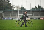 20 April 2008; Larry McVeigh, County committee member, walks his bicycle across the pitch after the game. Allianz National Football League, Division 2, Round 7, Dublin v Meath, Parnell Park, Dublin. Picture credit: David Maher / SPORTSFILE *** Local Caption ***