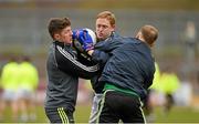 5 April 2015; Colm Cooper is tackled by his Kerry team-mates Kieran O'Leary, left, and Darran O'Sullivan, right, during a warm-up drill. Allianz Football League, Division 1, Round 7, Tyrone v Kerry. Healy Park, Omagh, Co. Tyrone. Picture credit: Stephen McCarthy / SPORTSFILE