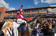 6 April 2015; Jockey Katie Walsh celebrates on board her mount Thunder And Roses after winning the BoyleSports Irish Grand National Steeplechase. Fairyhouse Easter Festival, Fairyhouse, Co. Meath. Picture credit: Pat Murphy / SPORTSFILE