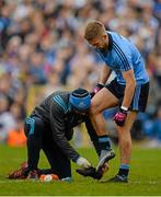 5 April 2015; Jonny Cooper, Dublin, has help putting back on one of his boots during the game. Allianz Football League, Division 1, Round 7, Monaghan v Dublin. St Tiernach’s Park, Clones, Co. Monaghan. Picture credit: Brendan Moran / SPORTSFILE