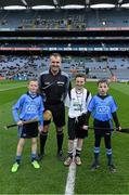 28 March 2015; Match referee Diarmuid Kirwan with Mark Connellan, St Patrick's N. S., Diswelstow, and mascots Conor Newton, left, nine years, and his St Fiachra's N.S. colleague Cillian Keegan, 9, before the game. Allianz Hurling League, Division 1, Quarter-Final, Dublin v Limerick. Croke Park, Dublin. Picture credit: Ray McManus / SPORTSFILE