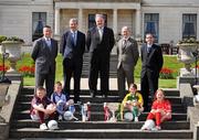 23 April 2008; At a press conference ahead of this weekend's Allianz National Football League Division 1 and 2 Finals, are, from left, Paul Caffrey, Dublin manager, Tomas O Flatharta, Westmeath manager, Brendan Murphy, Chief Executive, Allianz Ireland, Paddy Crozier, Derry manager and Pat O'Shea, Kerry manager, with children from Holy Trinity School, Donaghmede, Dublin, from left, Adam Ryan, Craig Guerin, Megan Donegan and Ellen Keegan. Radisson SAS St Helen's Hotel, Dublin. Picture credit: Brendan Moran / SPORTSFILE