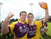 27 April 2008; Wexford's Paddy Colfer, left, and Redmond Barry celebrate after the final whistle. Allianz National Football League, Division 3 Final, Wexford v Fermanagh, Parnell Park, Dublin. Picture credit: Oliver McVeigh / SPORTSFILE